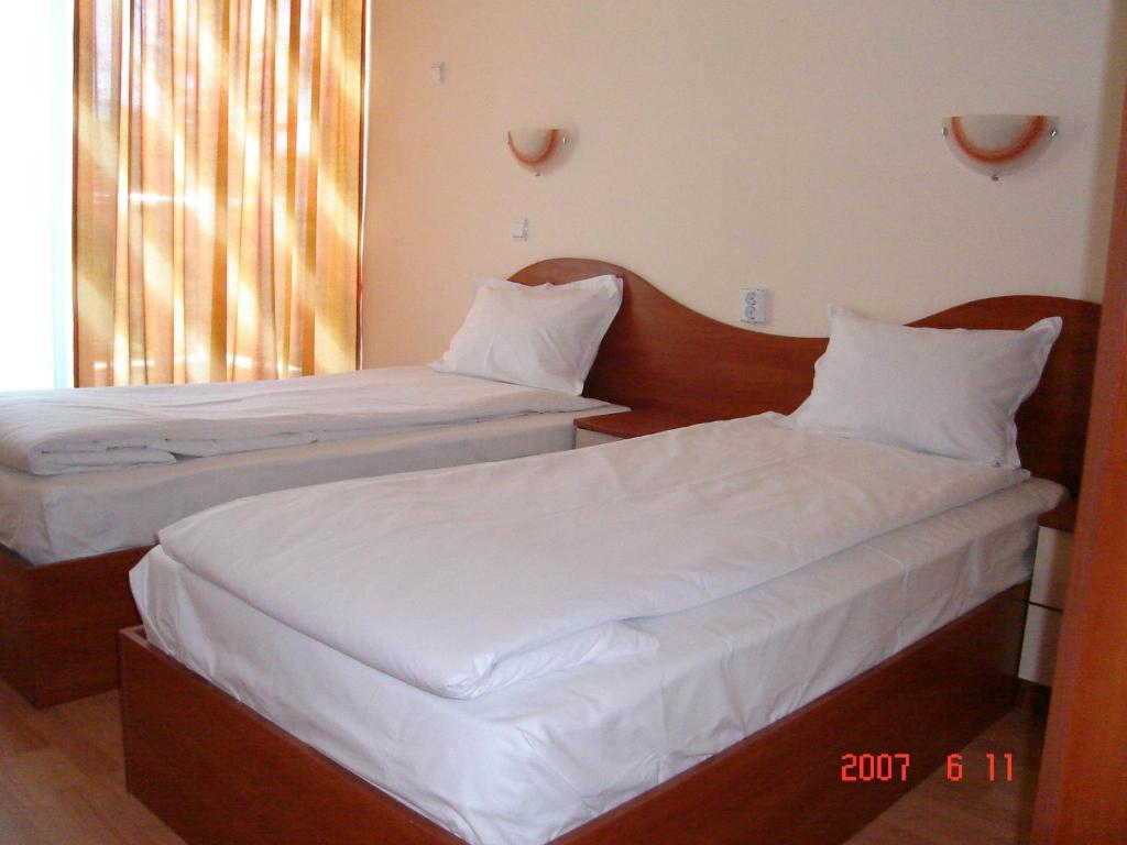 Hotel Harmony Pantai Sunny Ruang foto